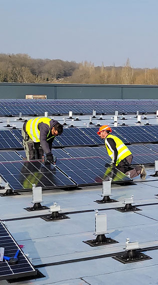 installation panneaux colruyt dole